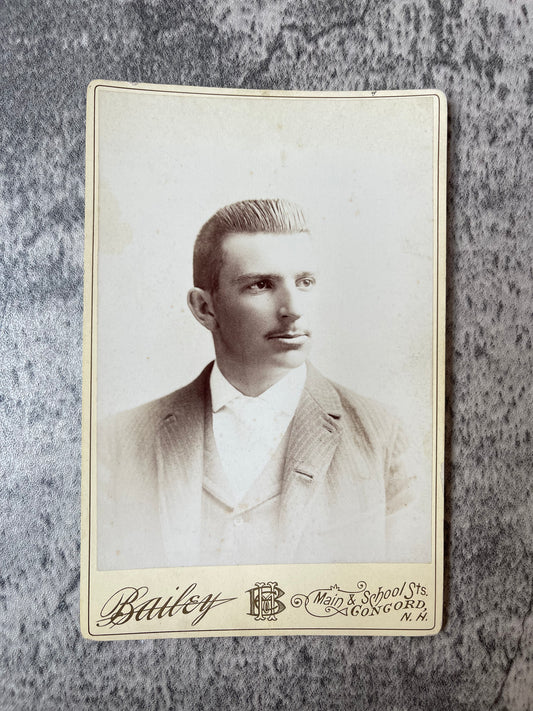 Cabinet Card Photo of a young man in a suit and tie. - Precious Cache